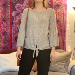 Grey knit sweater with tie in the front